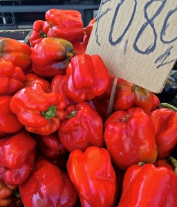 Peppers are abundant in the vegetable market now, making stuffed peppers are a perfect summertime piatto forte.